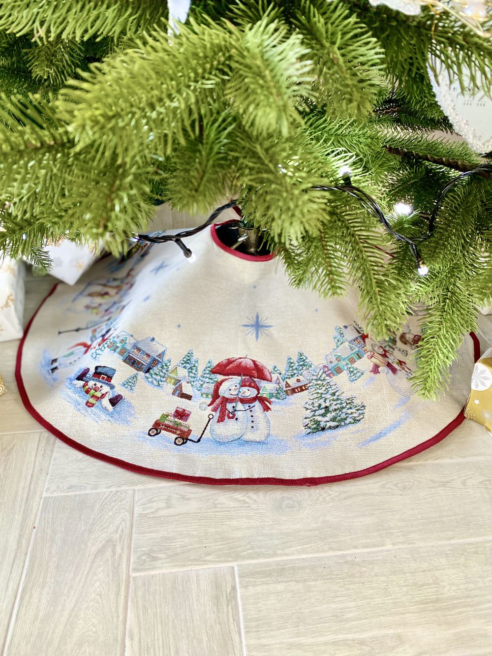 Christmas tree skirt «Snow family» with silver thread